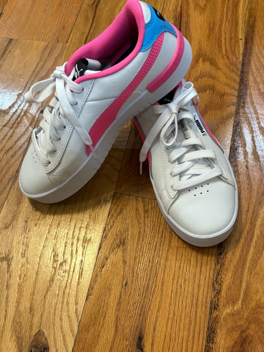 Puma Women’s White Sneakers with Pink and Blue Accents